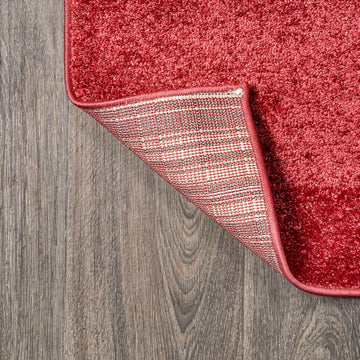 Haze Solid Low-pile Area Rug Red
